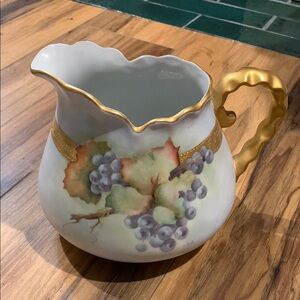 Beautiful vintage hand painted China pitcher w gold Embossed border and handle